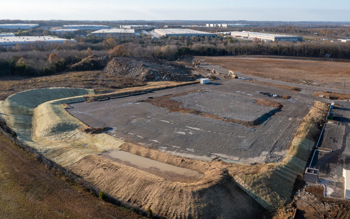 shaped dirt lot next to building